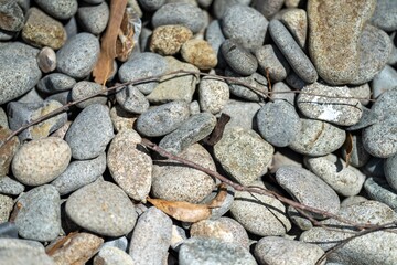 round rocks and pebbles on the beach in australia