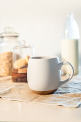cookies and morning drink (coffee, milk or tea) in light natural envoronment, kinfolk style breakfast. High quality photo
