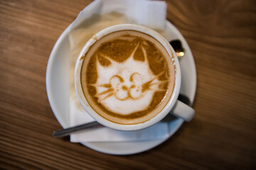 Cat face of latte art coffee in cup