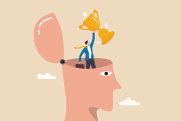 Success mindset, positive attitude to succeed, motivation or optimistic for self development, believe or confidence concept, success businessman holding winning trophy standing in his mindset head.