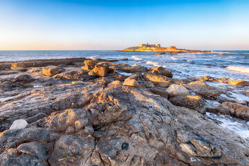 Dramatic morning scene of awesome spring seascape on the Passero cape Sicily.