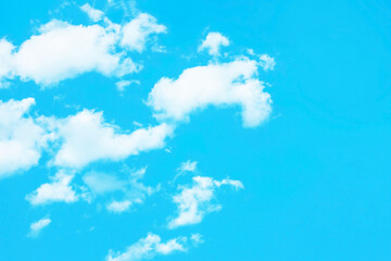 Fototapeta na wymiar Heaven background. Cloudy sky background. Peaceful bright blue sky texture. Fluffy clouds on the sky background. Cloudscape view.