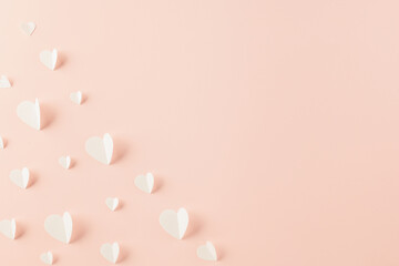 Happy Valentines Day background. Top view flat lay of paper elements cutting white hearts shape...