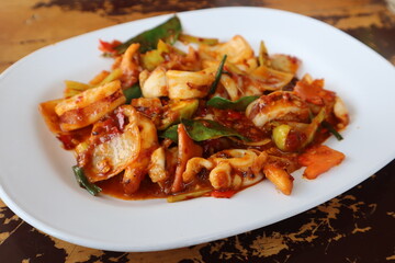 Authentic Thai Seafood Recipes, Stir Fried Squid with Roasted Chili Paste. Yummy and Exotic Thai Street Food You Should Try. 