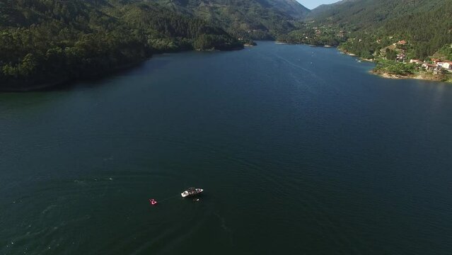 Boat on River in National Natural Park of Geres Portugal Aerial view. Stunning Nature Landscape