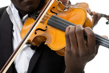 Violin in hand. African american. Studio closeup photo.