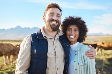 Love, cow and portrait of interracial couple on farm for agriculture, livestock and growth. Teamwork, cattle and hug with man and black woman in grass field for sustainability, health or environment