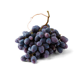 Ripe dark grapes on white wooden surface close up