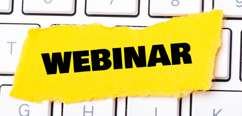 Word webinar on a small yellow piece of paper.