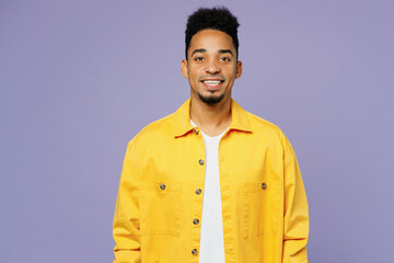 Young smiling happy cheerful positive man of African American ethnicity wear yellow shirt t-shirt...