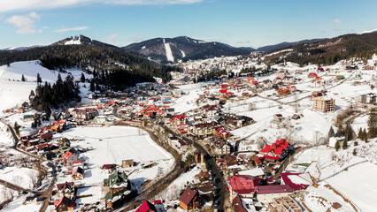 Beautiful view of the snowy city in the mountains. Snowy cold day, frosty weather season, snow, winter day