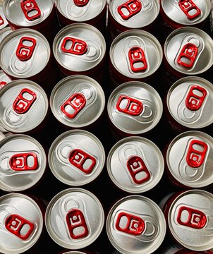 Overhead full frame view of aluminum drink cans