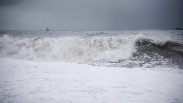 Storm in the Black Sea. Strong waves on the coast.
