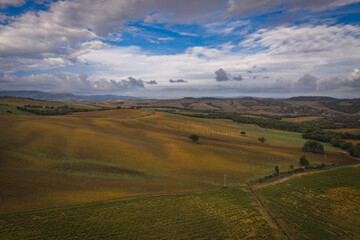 Tuscan countryside near San Quirico d'Orcia on early morning sunrise in Tuscany, Italy, October 2022
