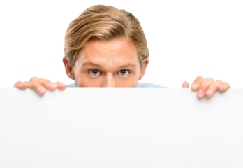 A businessman standing alone in the studio and hiding behind a blank poster isolated on a png background.