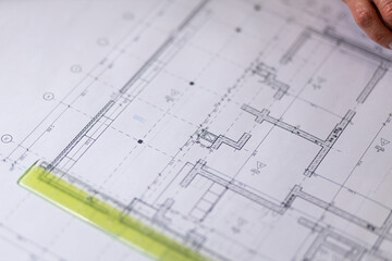 Architect workplace top view. Architectural project, blueprints, blueprint rolls on table.  Industry, hobby, workspace. Creation process