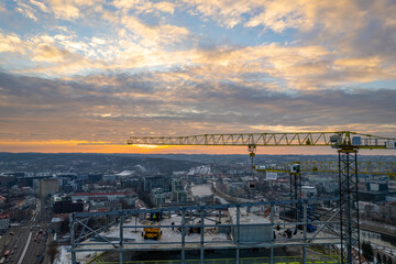 Aerial beautiful winter sunrise view of site construction in Vilnius, Lithuania