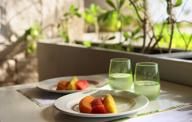 Breakfast with fruits and water. High quality photo