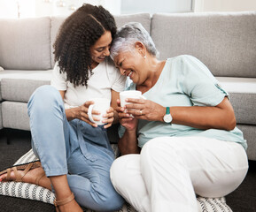 Relax, laughing and senior mother and daughter with coffee cup for home conversation, talking and bonding together. Black family, people or woman with elderly mom love, tea and living room carpet - obrazy, fototapety, plakaty