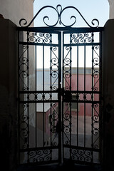 Ornate fence pattern in Fira, Santorini, Greece