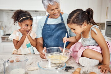 Learning, grandmother and cooking girl in kitchen mixing baking dough in bowl in home. Education, family wow and surprised kid with grandma teaching children how to bake for child development
