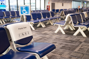 Airport seats, passenger seats, special seats Empty metal chair in the airport waiting room furniture pictures Airport departure or arrival concept image