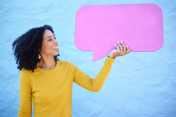 Communication, black woman and speech bubble for advertising, information or mockup on blue studio background. African American female, lady or poster for logo, happy or brand development on backdrop