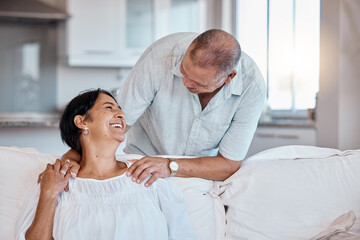 Obraz premium Relax, retirement and happy with a senior couple in the living room of their home together for love. Sofa, bonding or marriage with a mature man and woman relaxing in the lounge of their house