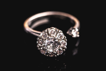 diamond ring on black background