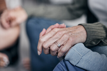 Holding hands, praying or therapy with group, support and worship with mental health, faith and...