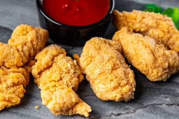fast food chicken nuggets deep fried poultry meat meal food snack on the table copy space food background rustic top view