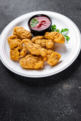 fast food chicken nuggets deep fried poultry meat meal food snack on the table copy space food background rustic top view