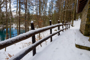 View of Lame lake in Aveto Valley in winter time with snow, in the hamlet of Rezzoaglio, province of Genoa, Italy.