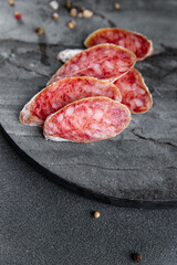 sausage Fuet fresh cured meat product meal food snack on the table copy space food background rustic top view