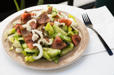 vegetarian healthy vegetable salad on brown plate