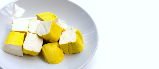 Yellow tofu on white background.