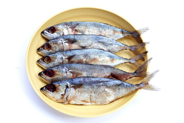 Salted fish on white background.