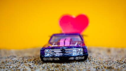 Minahasa, Indonesia : December 2022, the toy cars transporting hearts