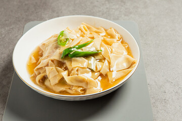 Stir-fried tofu skin on a plate