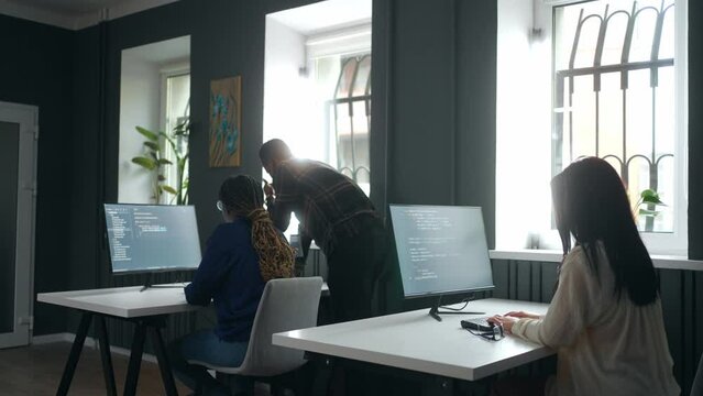 woman student learning on data scientist course in university, multiethnic people in class