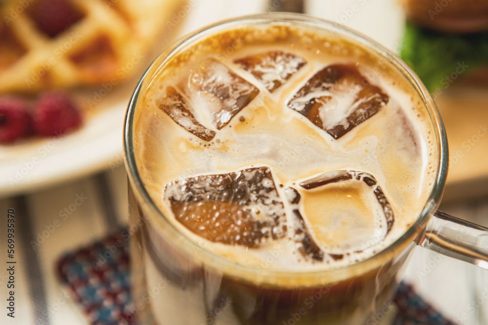 Wall mural iced americano in a cup