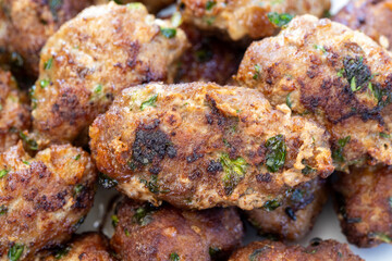 hearty meatballs served in a small bowl.