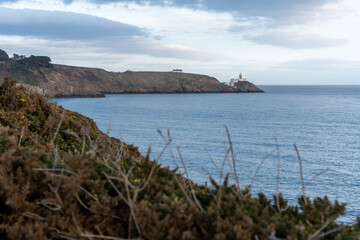 Fototapeta na wymiar Landscape, shores and cliffs in Howth, Ireland