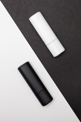 Technology of electronic cigarettes. Close-up of a white and black electric hybrid cigarette with a heater. tobacco heating system. New tobacco heating system