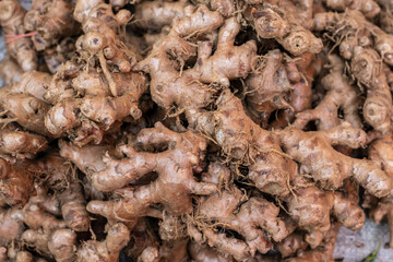 Top View Pile of Fresh Ginger for Sale in the Vegetables Market, Close-up Ginger, Food background.