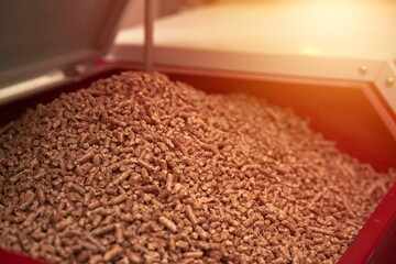 Solid-fuel boiler with pellet-fuel in boiler room. Wood pellet heating stove.