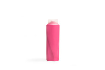 Bote de champú de color rosa sobre un fondo blanco liso y aislado. Vista de frente y de cerca. Copy space