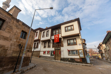 Fototapeta na wymiar Afyonkarahisar, Turkey, January 20, 2023: Traditional turkish ottoman houses in Afyonkarahisar old town. 