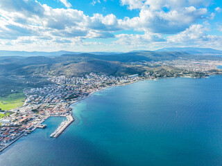 Aerial view with drone of the seaside town Urla Cesmealti in Izmir, Turkey. Iskele port.