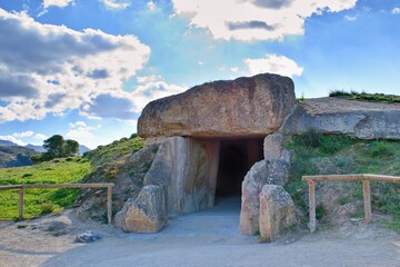 Dolmen de Menga - exterior of megalithic burial tumulus. One of the largest known ancient...